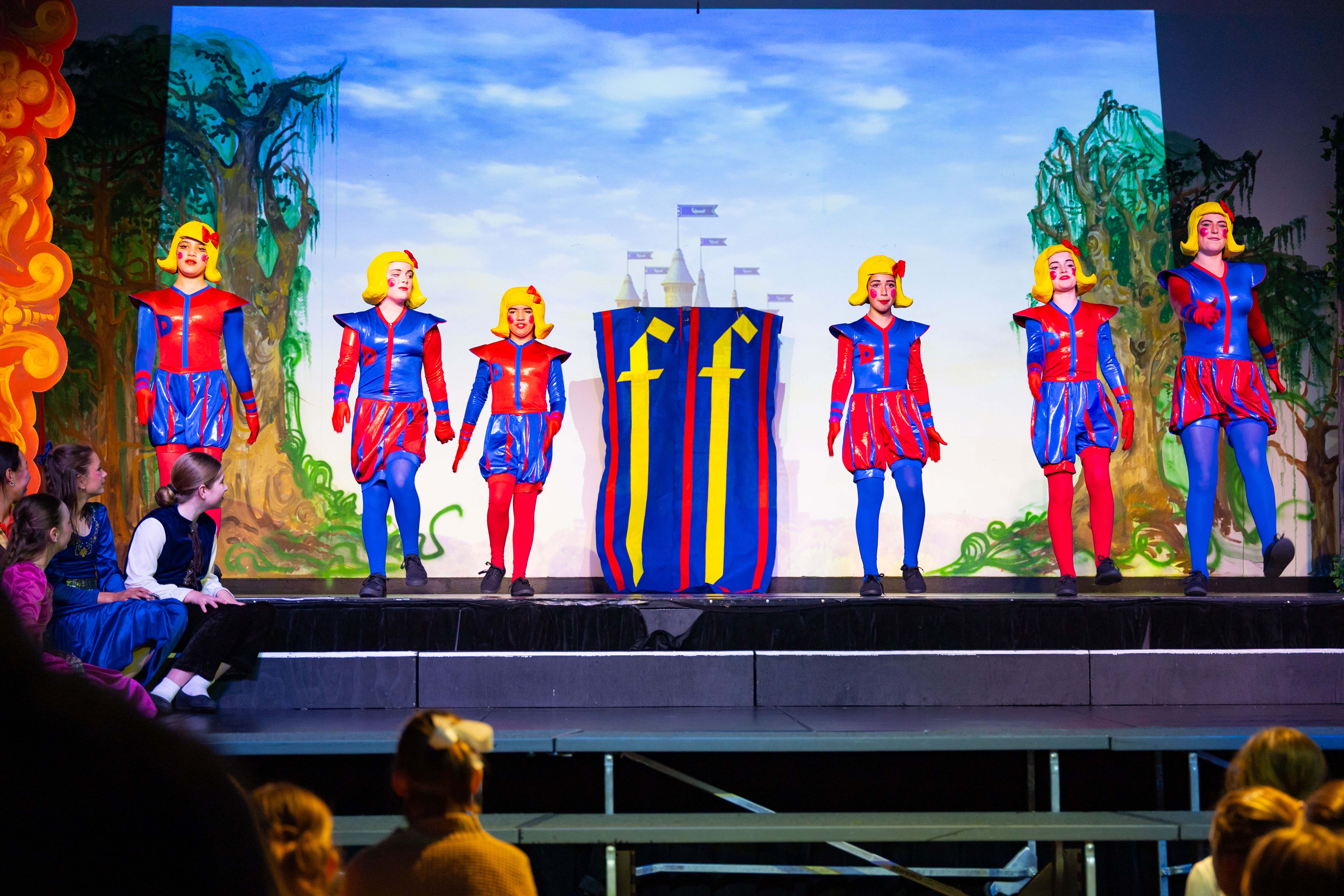 Students performing on stage in the Travers Morphett Hall at Fahan School
