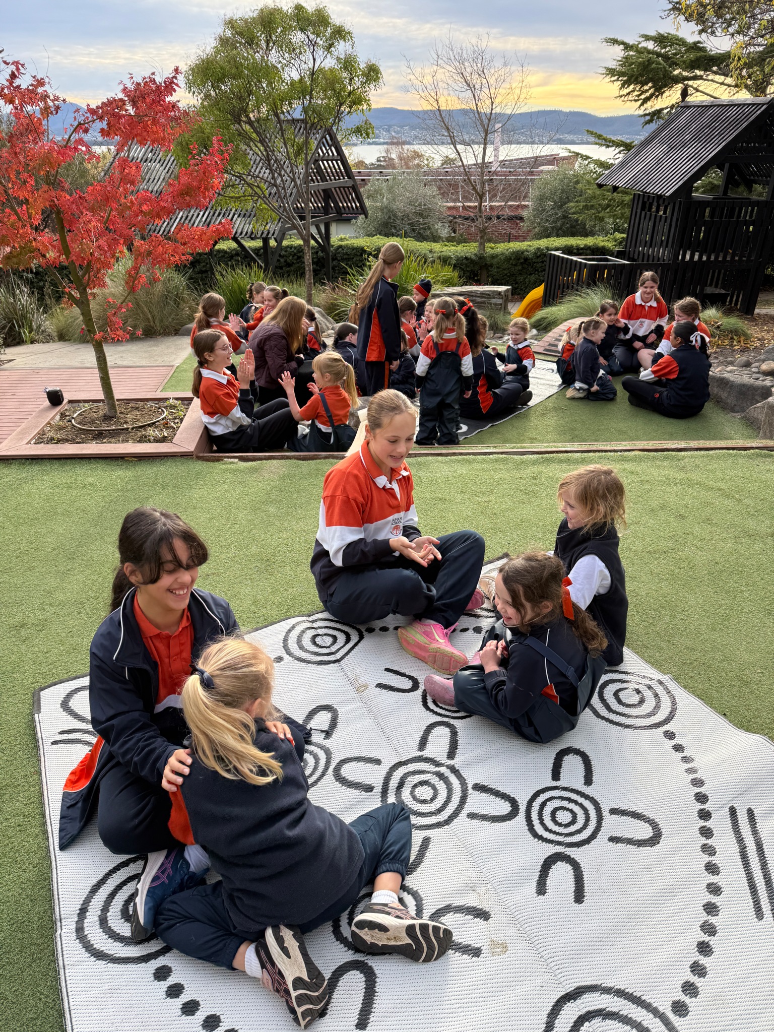 Fahan students learning outdoors with River Derwent views