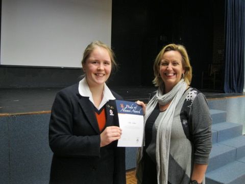 Nikki Goddard receives her Pride of Fahan Alumni Award from FSAA President, Ms Kathryn Thomas