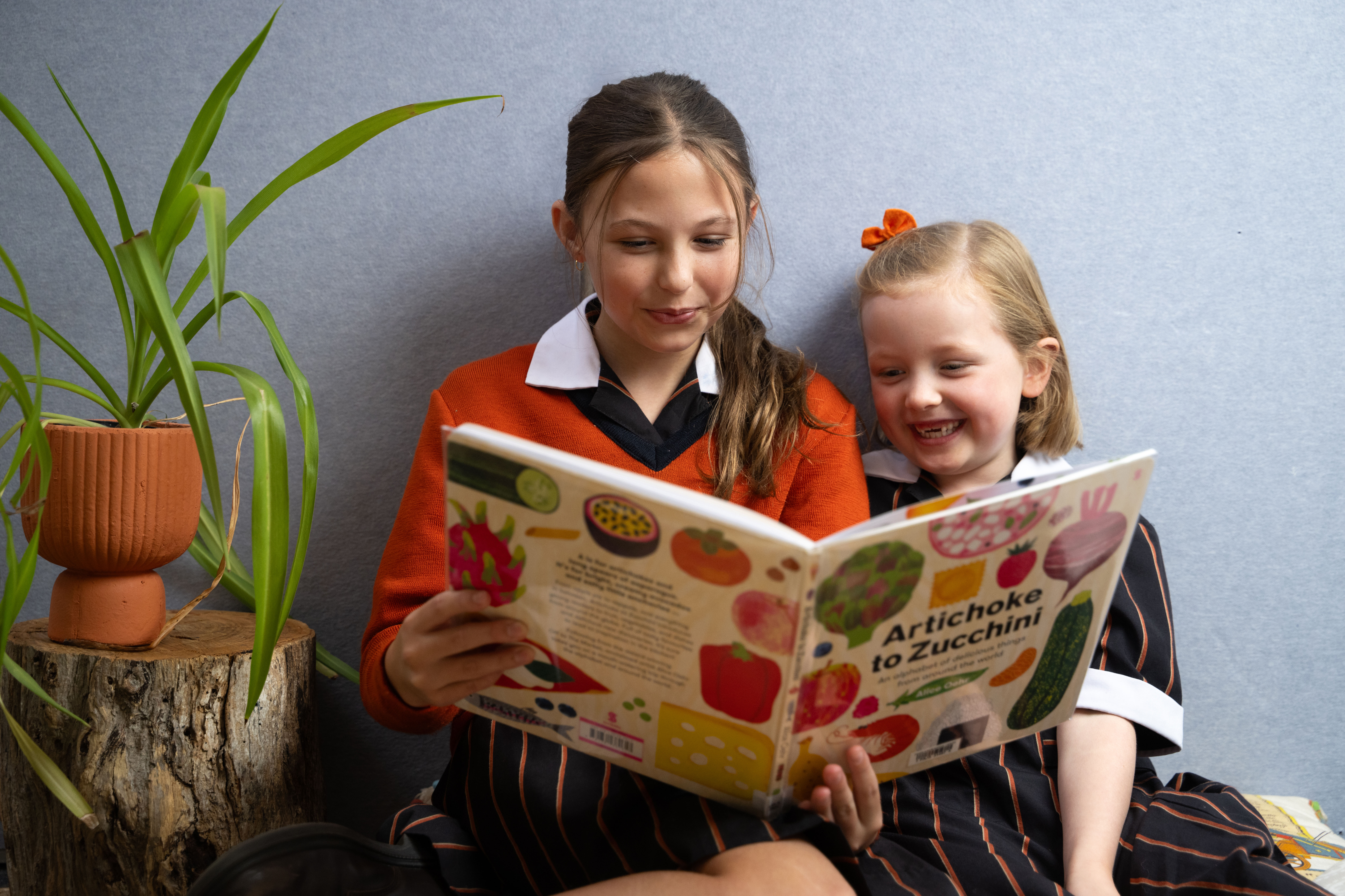 students reading a book