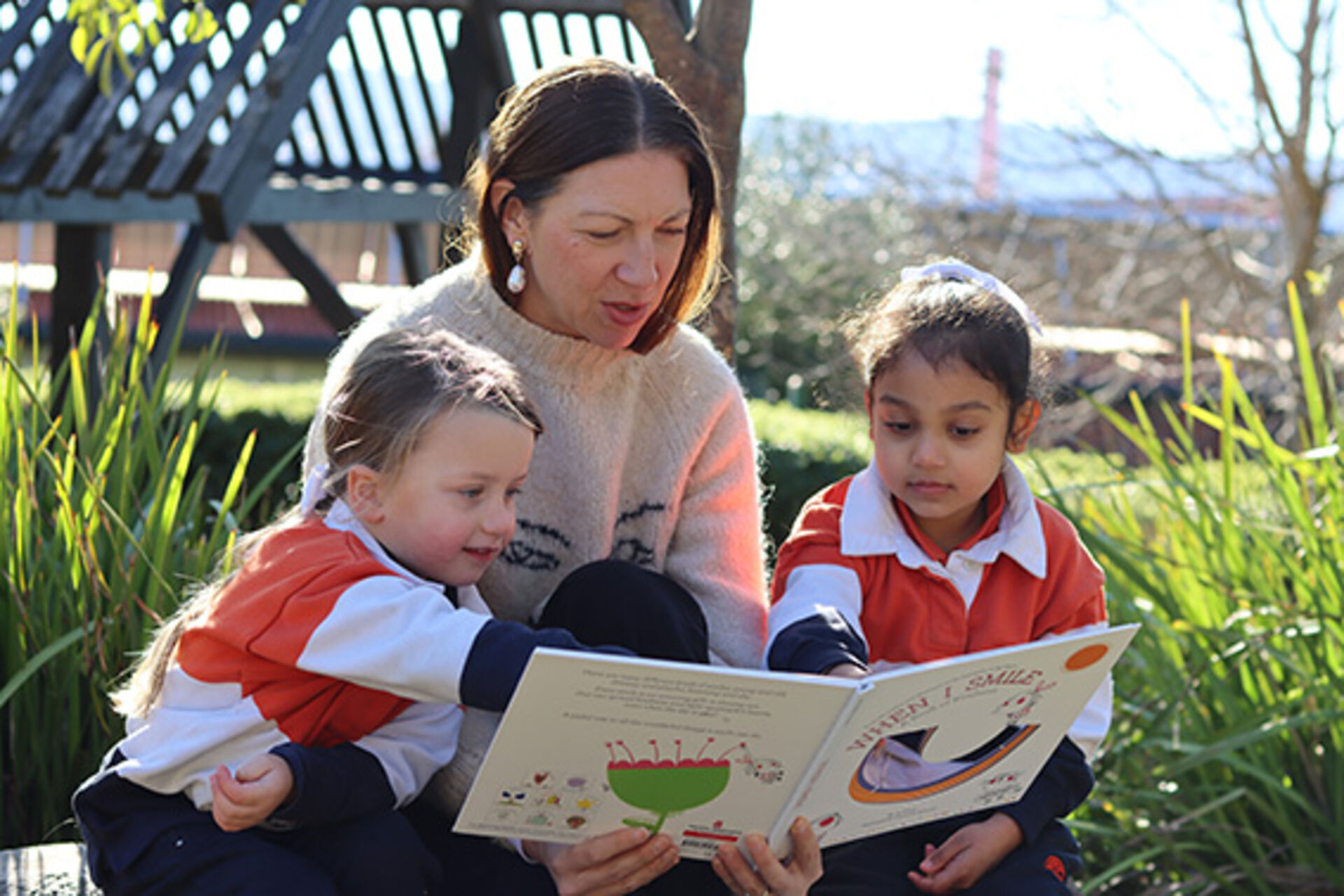Kindergarten teacher with children at Fahan School