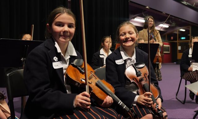 Year 4 Strings Students Enjoy Music Collaboration with The Hutchins School Students